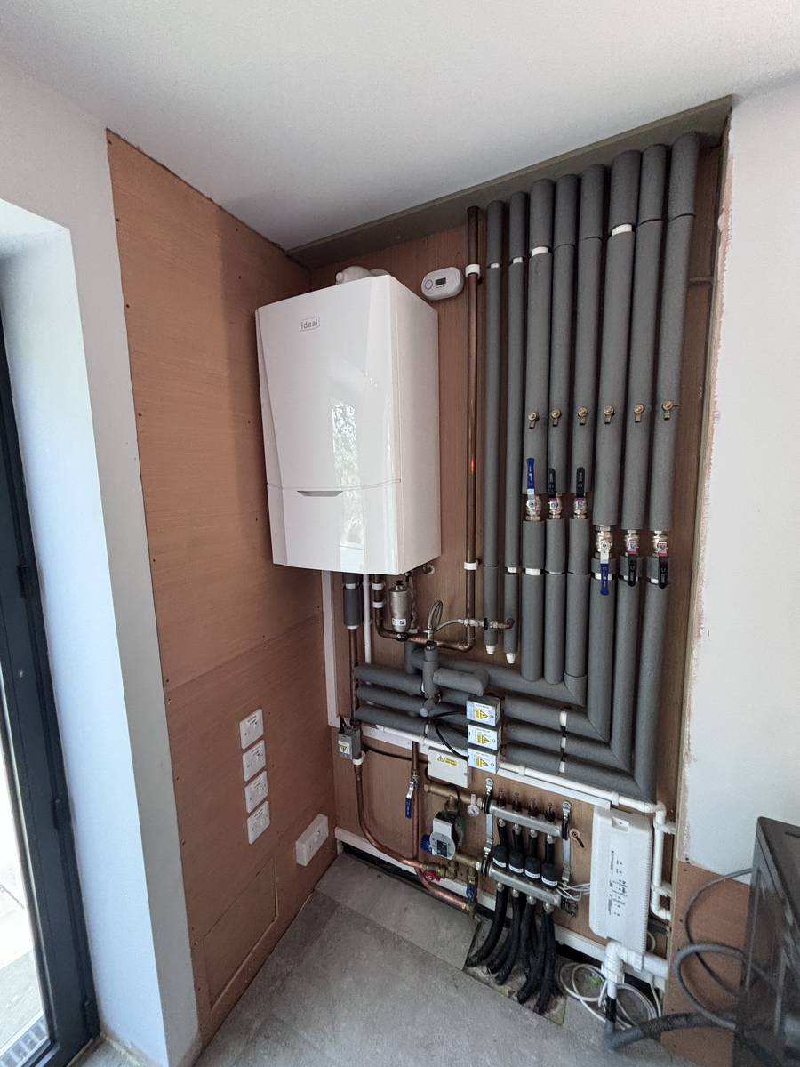 Ideal boiler with UFH manifold & insulated pipework