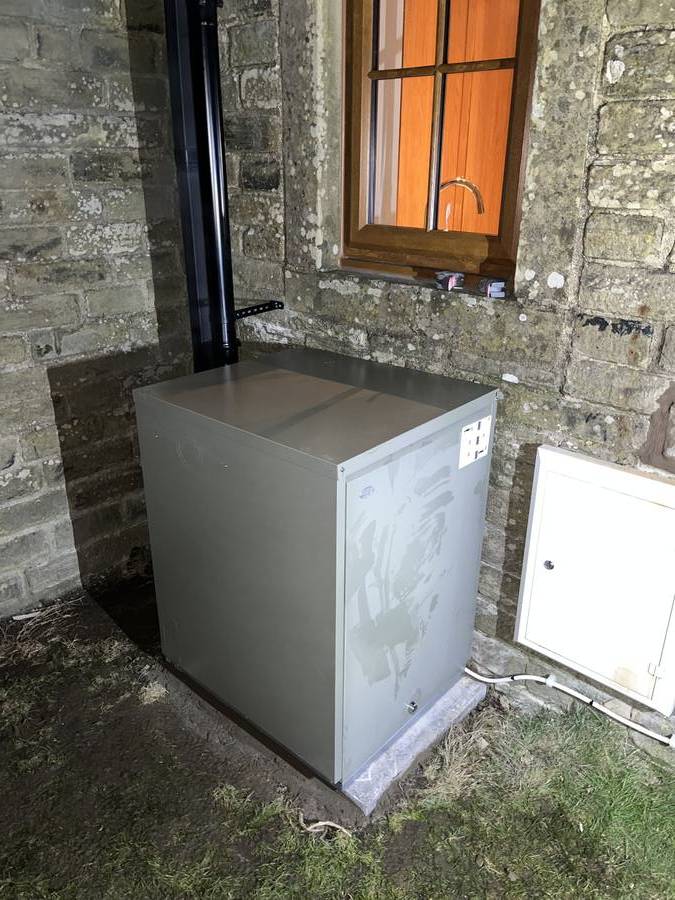 External oil boiler — stone farmhouse